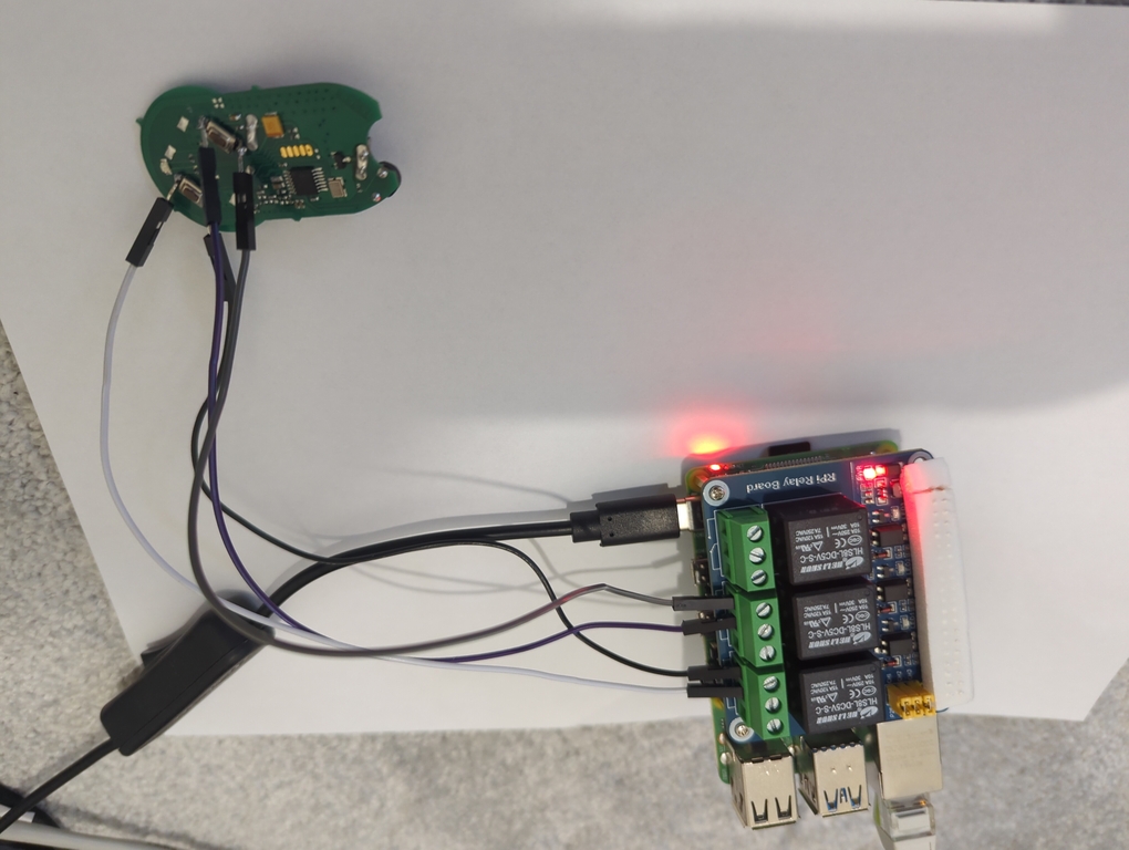 Bad photo of the wireless fob wired up to the Pi relay board